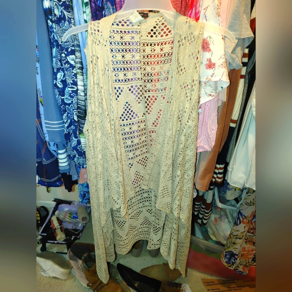 Sleeveless duster